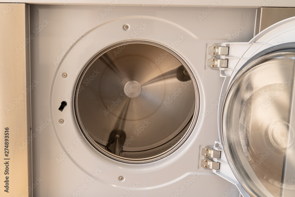 Washing machine with an open Front door detail Washing machine with an open Front door detail
