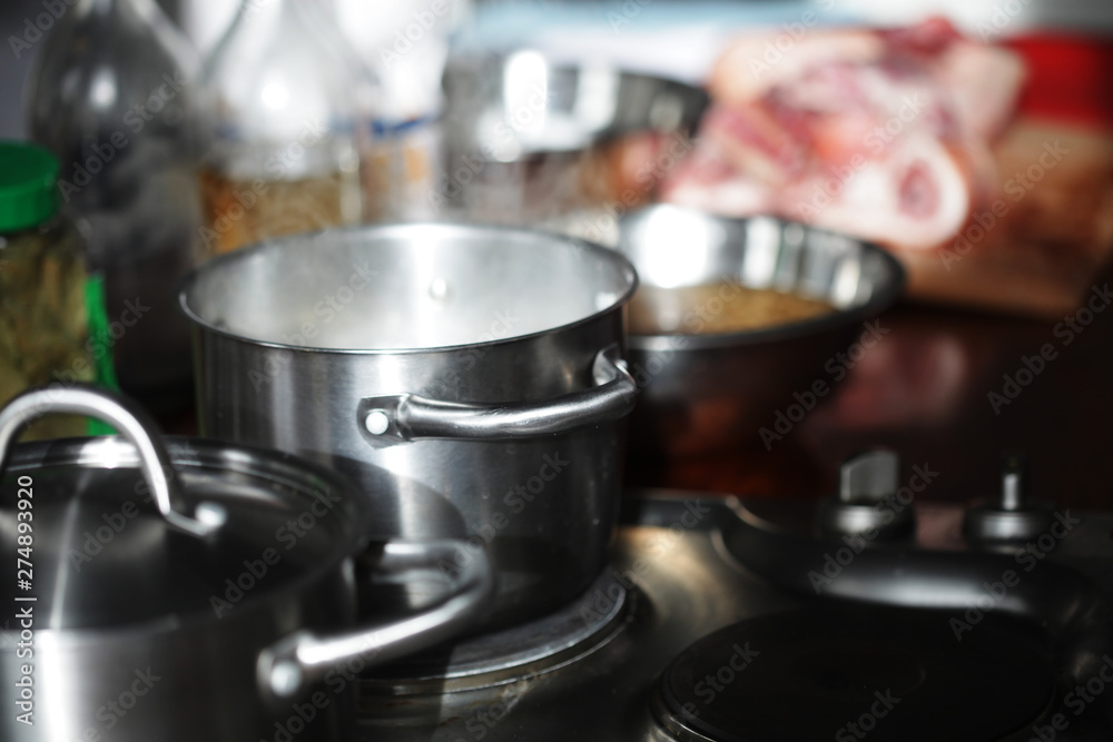 metal pans in the kitchen close up