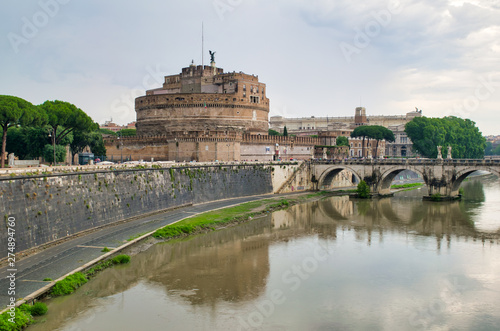 ROME, ITALY - JUNE 2014: Tourists visit Saint Angel Castle. The city attracts 15 million people annually