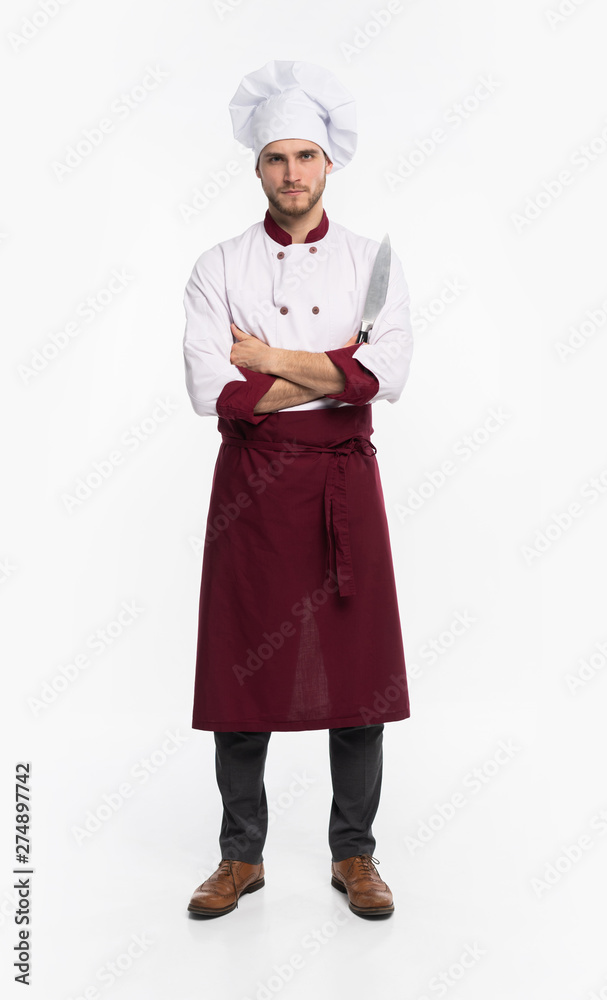 Positive handsome chef cook in beret and white outfit isolated on white background. Positive handsome chef cook in beret and white outfit isolated on white background.
