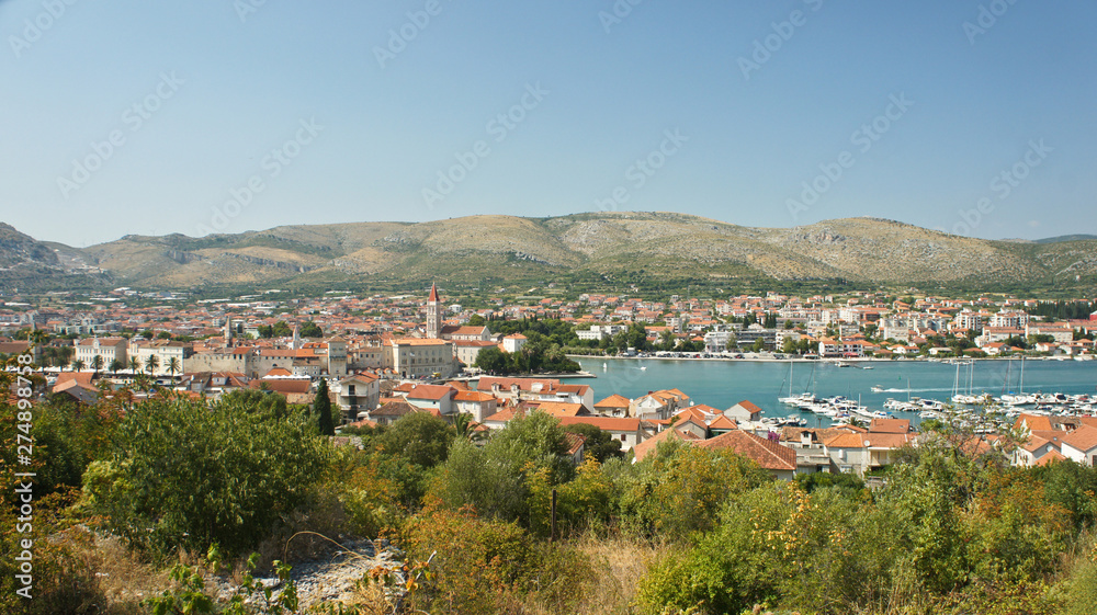 Scenic view of the city with mountain background, beautiful cityscape, sunny day, Trogir, Dalmatia, Croatia