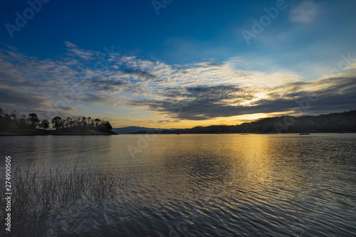 Wide-angle lake in the morning, sunrise after the mountain © cafetoday