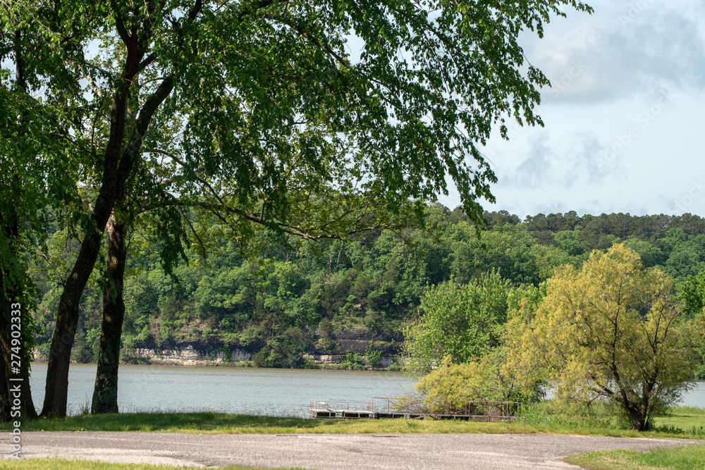 An inviting scene at lake Eucha in Oklahoma on a spring day. Bokeh effect.