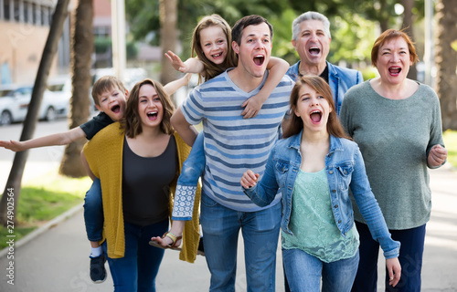 males and females walking in the town