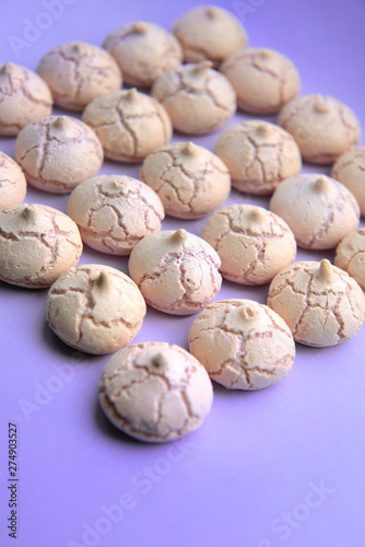 group of meringues arranged on colored background