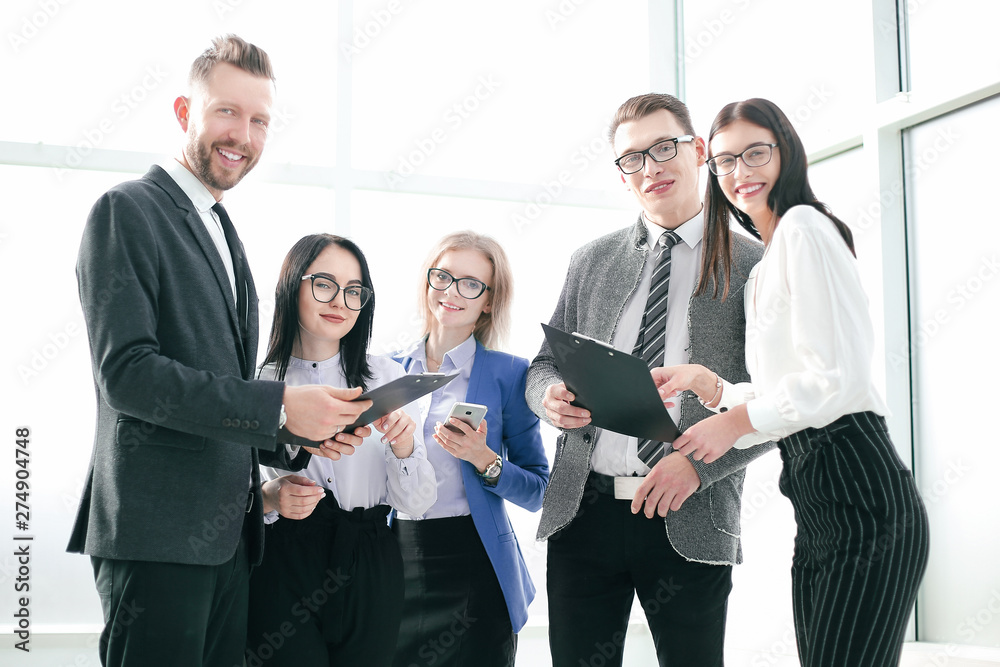 close up. smiling business team with business documents close up. smiling business team with business documents