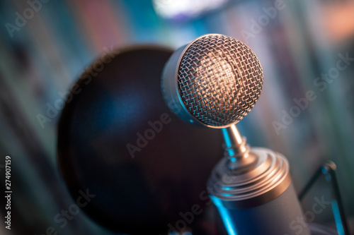 microphone on stage studio recording sound voice karaoke emitter bject musical singing conference performance talent equipment gear audience concert show live recital acoustic radio technology metal photo