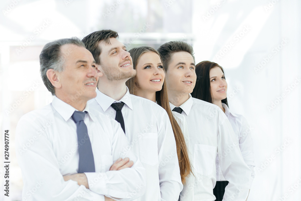 successful business team looking at copy space.