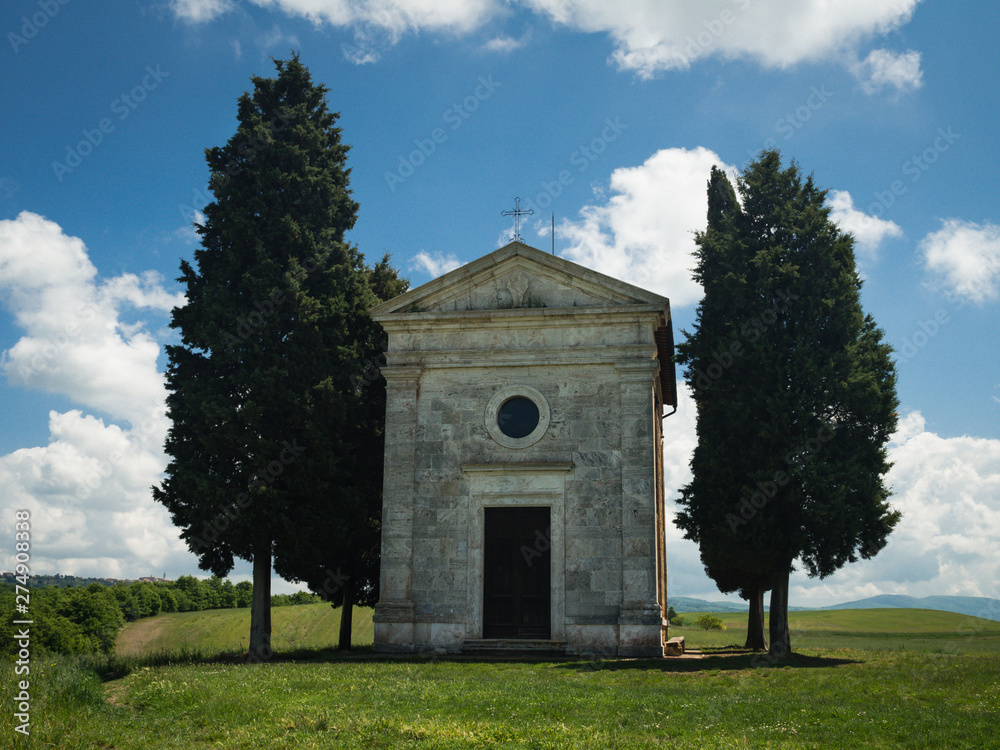Chapel of Capella di Vitaleta in the Tuscan landscape of the Val d'Orcia