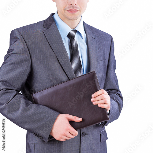 young employee standing with working papers. isolated on white. business concept