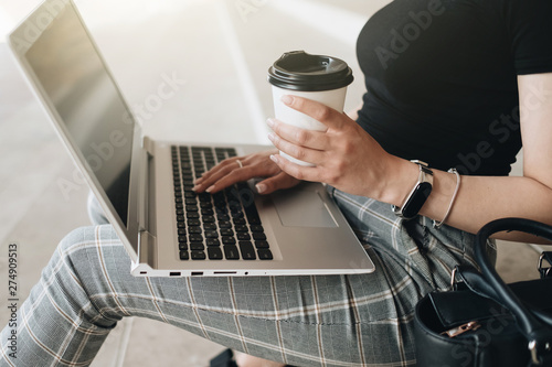 Woman Working on Laptop Outdoors, Freelance Concept © Romvy