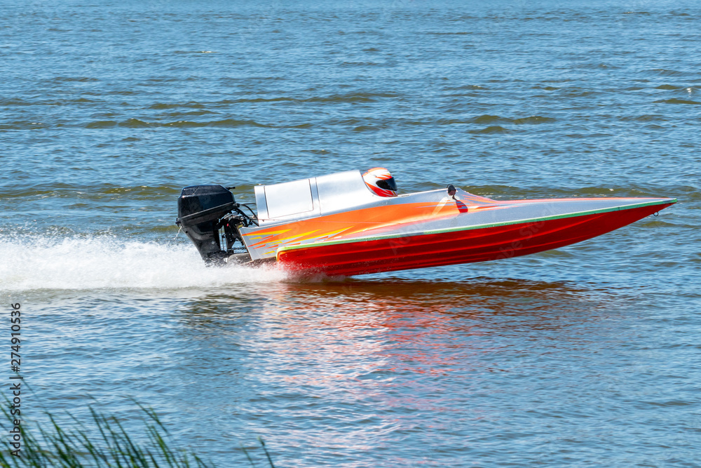 Fototapeta premium Speed boat go fast along the lake