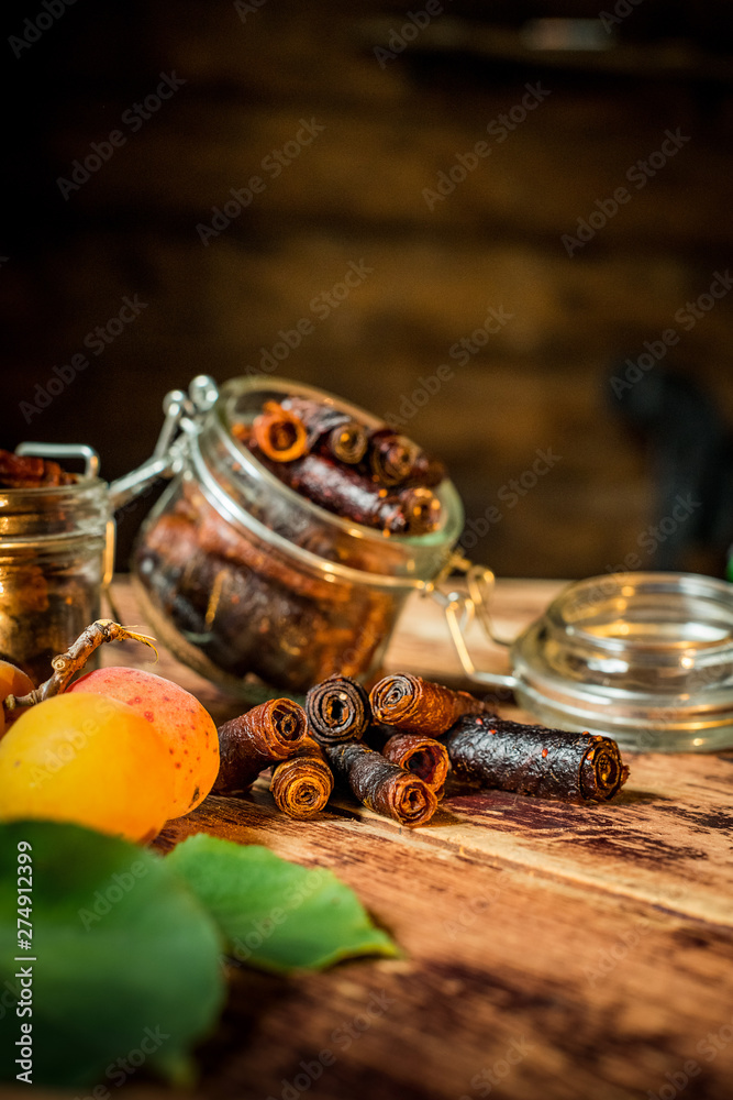 the sweetness of the apricot folded in jars tubes