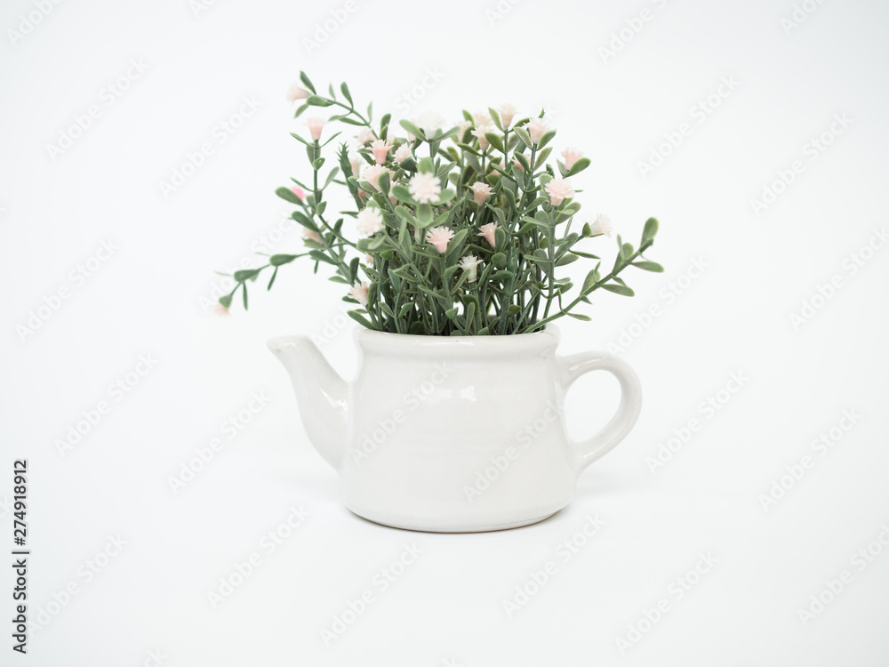 cup of tea with flowers isolated on white