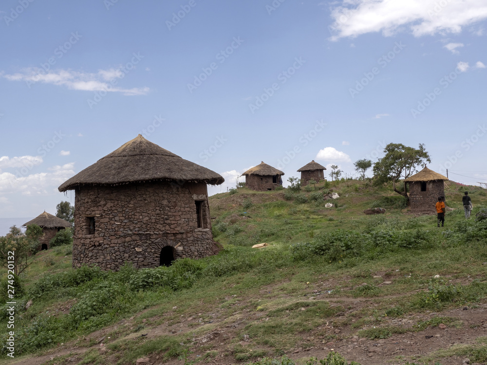 Traditional lodges are located on the slopes, Lalibela, Ethiopia