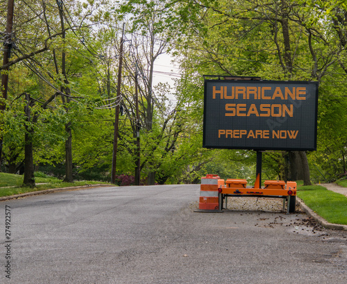 Canvas Print Digital electronic mobile road sign that says Hurricane Season prepare now, on t