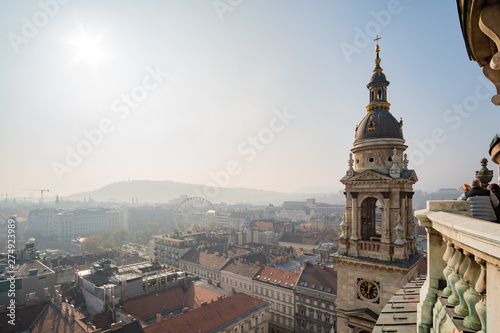 Tower of the St. Stephen s Basilica and aerial cityscape