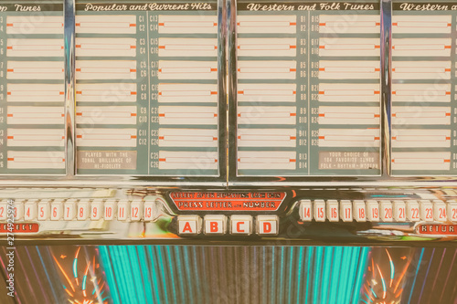 Old jukebox with empty music labels photo