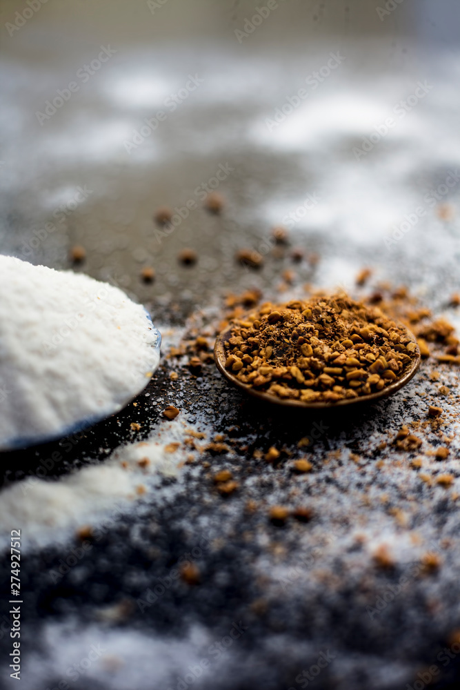 Hair growth remedy of rice flour water and fenugreek seed powder on wooden  surface. Stock Photo | Adobe Stock