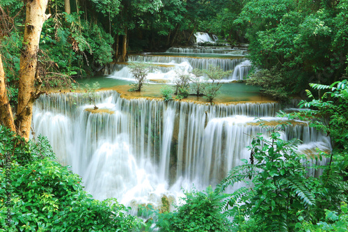 Huai Mae Khamin Waterfall  Kanchanaburi Province  Thailand With water and lush green trees.
