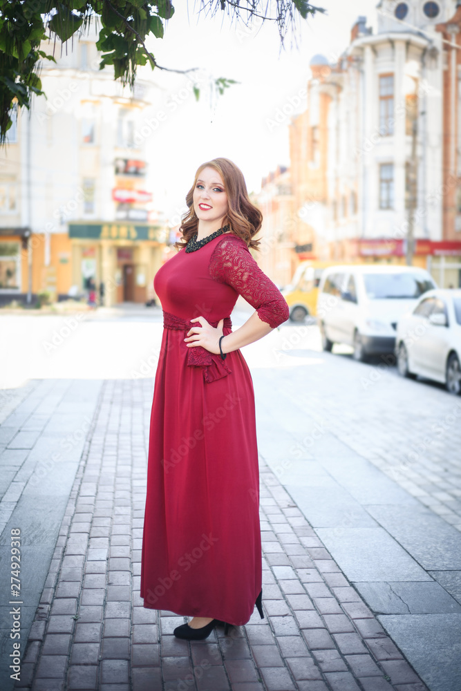 Young and beautiful woman in casual clothes in the street.