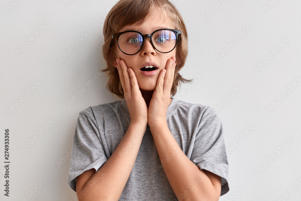 Shocked schoolboy before exam Shocked schoolboy before exam