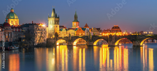 Sunset view on Prague old town and iconic Charles bridge on Vltava river, Czech Republic © Rastislav Sedlak SK