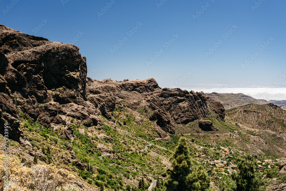 Nature and landscape of the Gran Canaria. Rocky mountains range, valleys, ocean. Nature and landscape of the Gran Canaria. Rocky mountains range, valleys, ocean.
