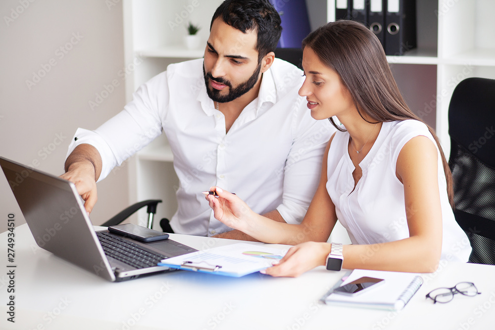 Side view portrait of man and woman armwrestling, exerting pressure on each other, looking eyes in eyes, struggling for leadership. Business, society concept photo Side view portrait of man and woman armwrestling, exerting pressure on each other, looking eyes in eyes, struggling for leadership. Business, society concept photo