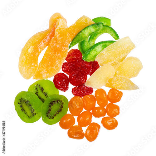 Pile candied dried tropical fruits on the white background isolation, top view