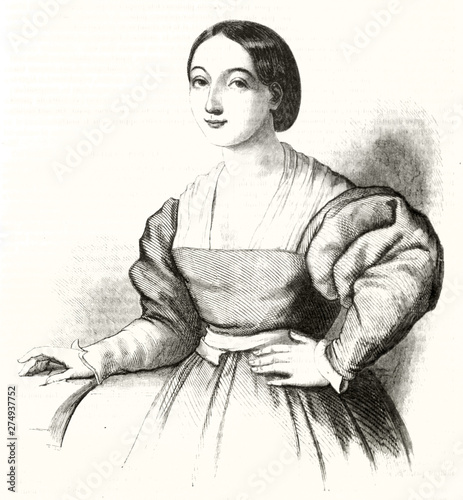 Old engraved style half body portrait of a beautiful woman posing with simple medieval dresses. Supposed to be Raphael's mother. By unidentified author publ. on Magasin Pittoresque Paris 1848 photo