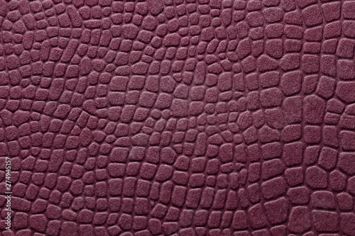 Burgundy color textured paper. Background, lizard texture