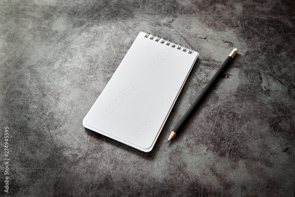 Office desk Blank note book and pencil Office desk Blank note book and pencil