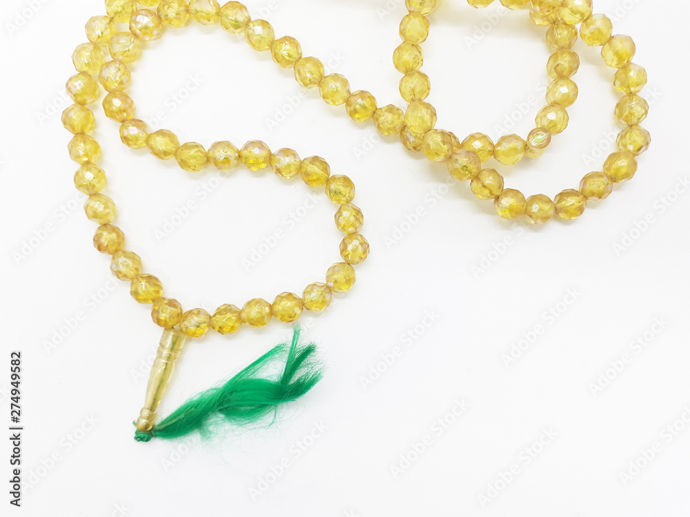 Islam Religious Praying Beads Rope in White Isolated Background Islam Religious Praying Beads Rope in White Isolated Background
