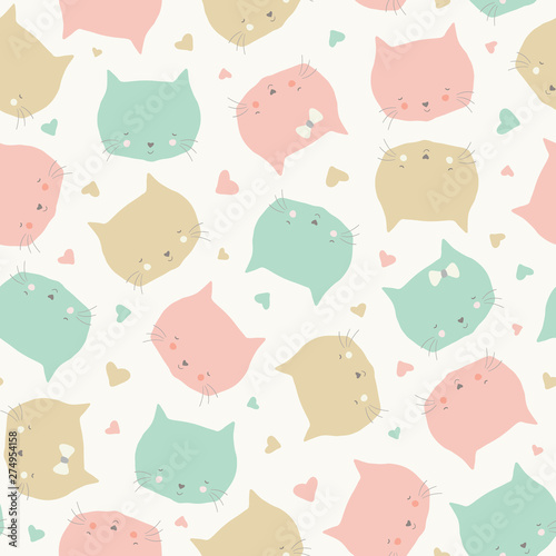 Seamless repeat pattern of sweet cat faces in pastel colours. Vector design ideal of children and babies.