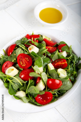Purslane salad with tomatoes and cucumbers