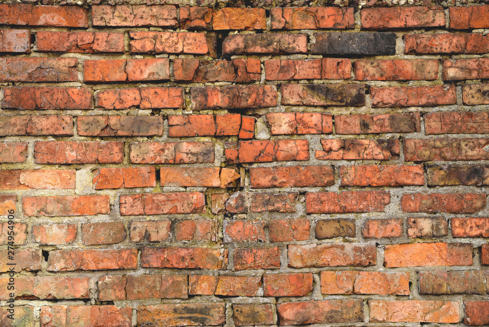 Obraz premium Old brick wall weathered and broken bricks, background