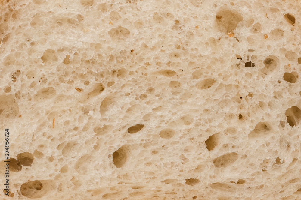 Fresh bread in a cut close up. Background Texture