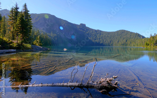 Fototapeta Naklejka Na Ścianę i Meble -  sunlit lake in mountains