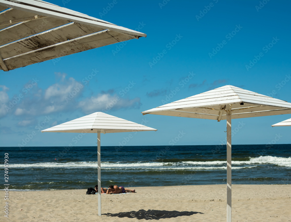 wooden sunshades on the beach