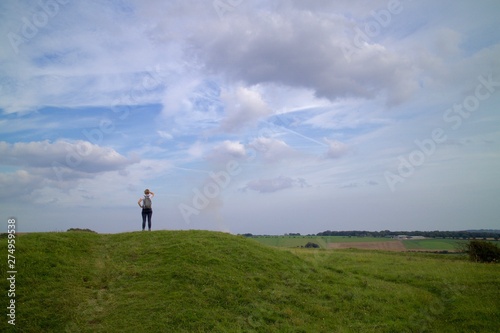 Woman walking in the distance on Winchester Hill, South Downs Way