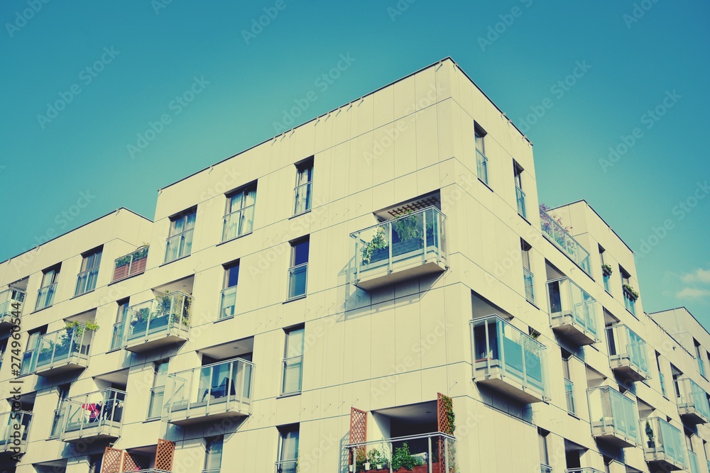 Modern apartment building exterior. Retro colors stylization