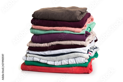 Pile of colorful clothes, isolated white background