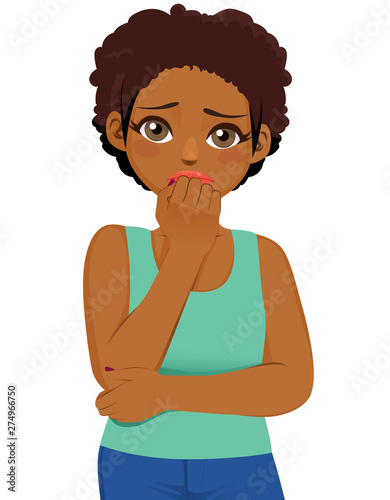 Young black girl scared expression afraid and anxious biting her finger nails looking at camera with wide opened eyes isolated on white background