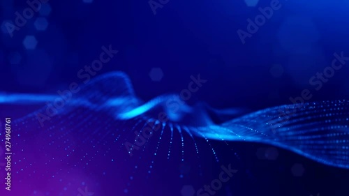 complex blue composition with luminous particles that form wavy structures in the air. 4k 3d looped smooth animation with glow paricles. sci-fi microworld or space background. 5 photo