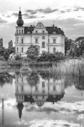 WROCLAW, POLAND - JUNE 21, 2019: Palace in Biskupice Podgorne near Wroclaw, Poland. Cloudy sky on the last day of spring. photo