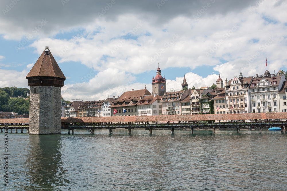 Panoramic view of Lucerne city with Chapel Bridge and river Reuss