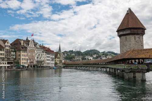 Panoramic view of Lucerne city with Chapel Bridge and river Reuss © TravelFlow