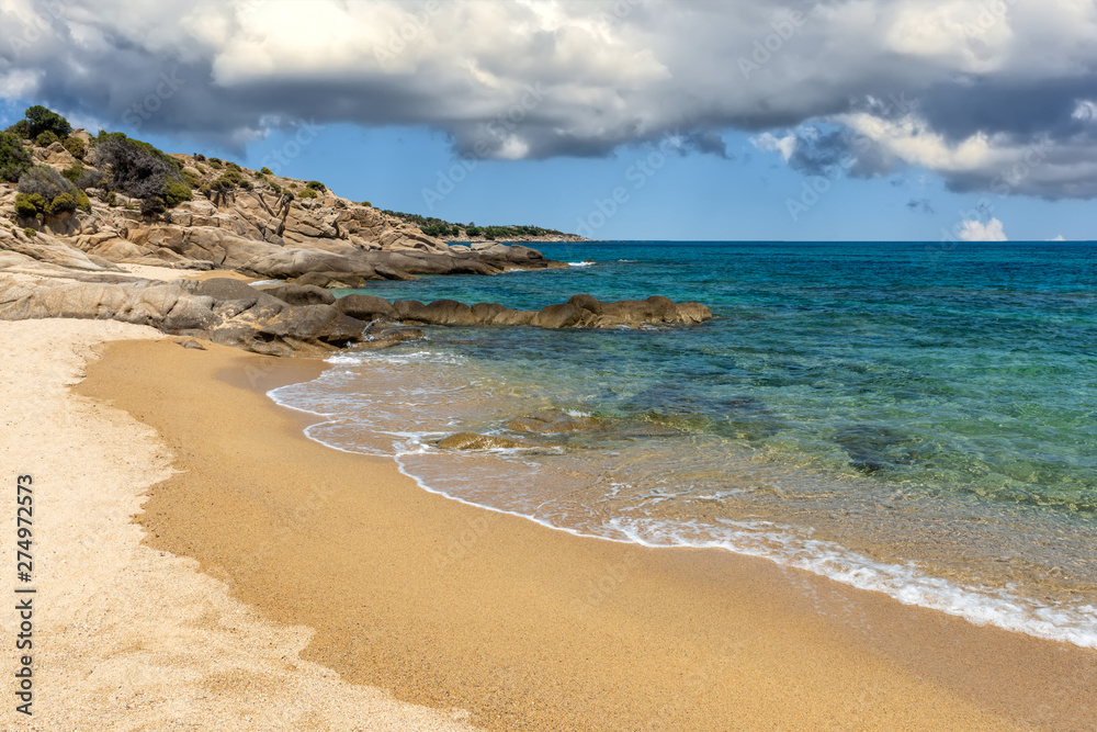 Landscape with beach, the sea and the clouds in the blue sky Landscape with beach, the sea and the clouds in the blue sky