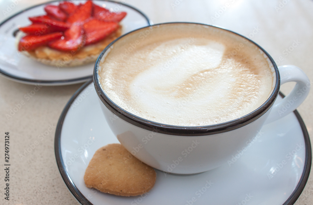 Cappuccino and strawberry tart. Cappuccino and strawberry tart.